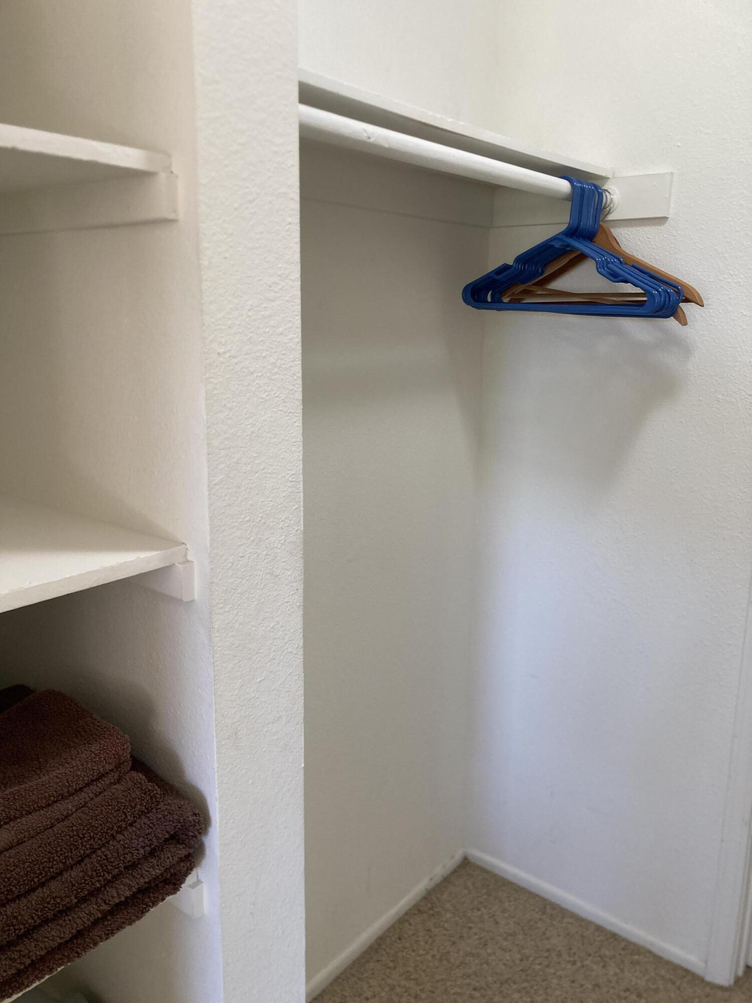40553 Pebble Beach Circle Palm Desert, CA 92211 - Photo 17 of 22 a close view of a closet in the kitchen