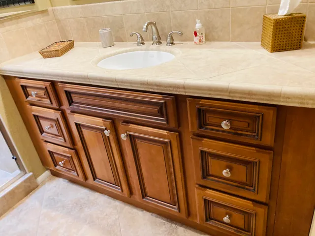 a close view of sink and washing machine