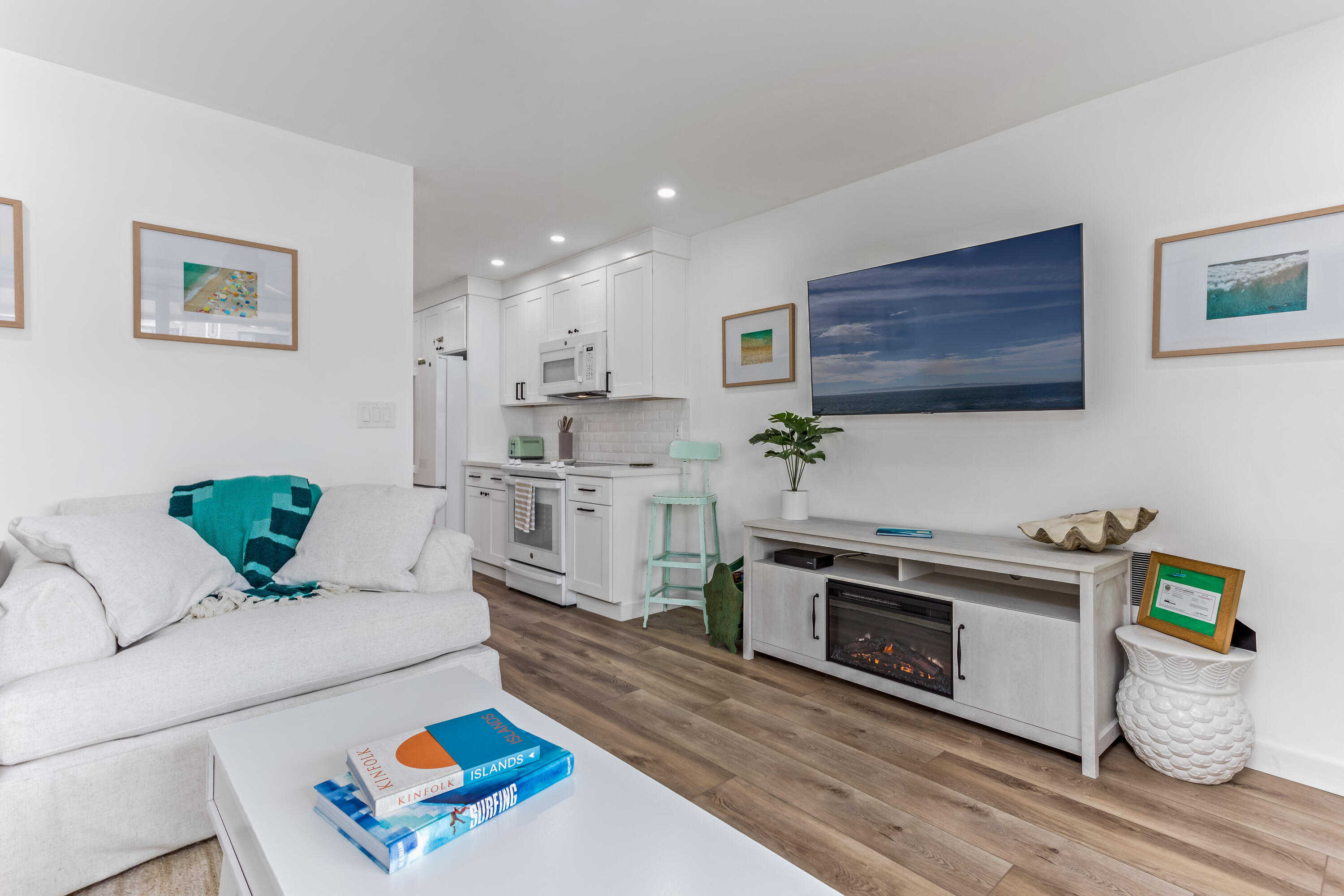 4902 Sandyland Road, Unit 134 Carpinteria, CA 93013 - Photo 4 of 19 a living room with stainless steel appliances furniture and a fireplace