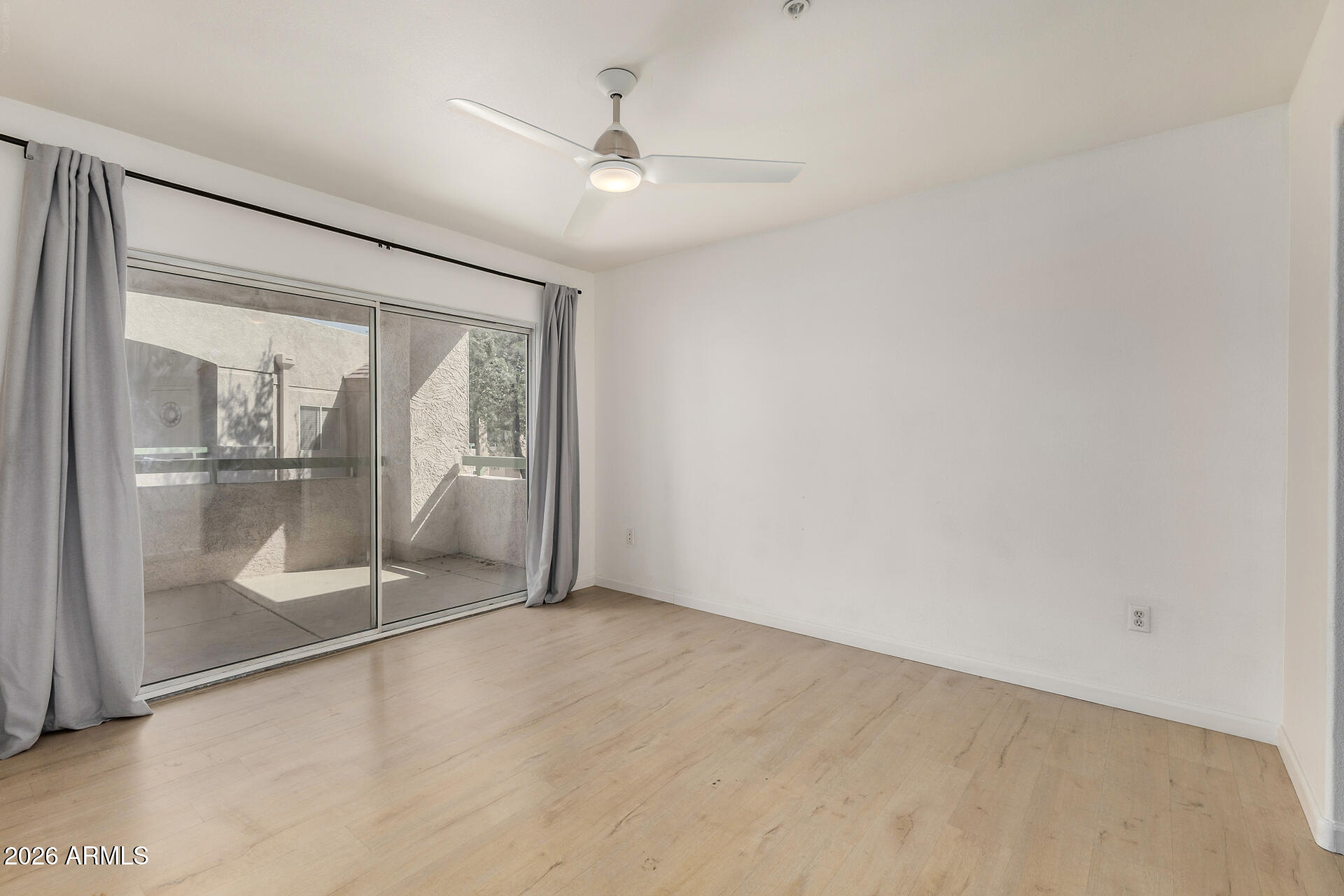 1295 North Ash Street, Unit 828 Gilbert, AZ 85233 - Photo 12 of 43 a view of an empty room with a mirror