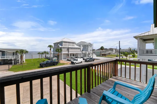 a view of a street from a balcony