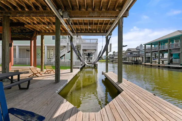 a view of swimming pool with outdoor seating