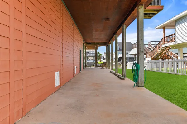 a view of a pathway both side of house