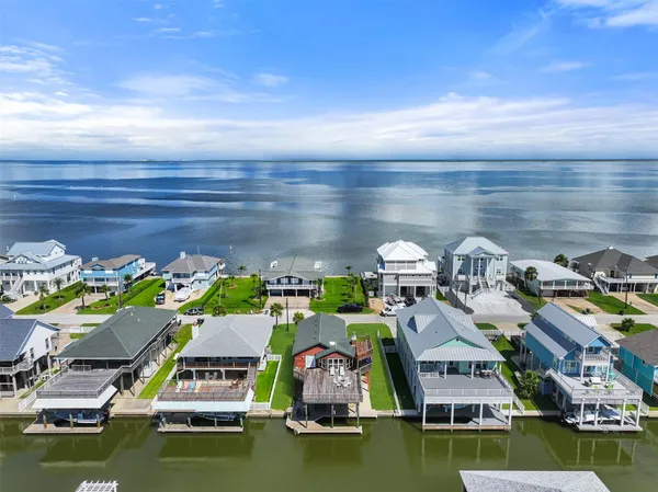 a view of swimming pool with chairs