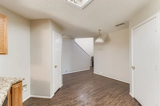 a view of a kitchen with an empty space