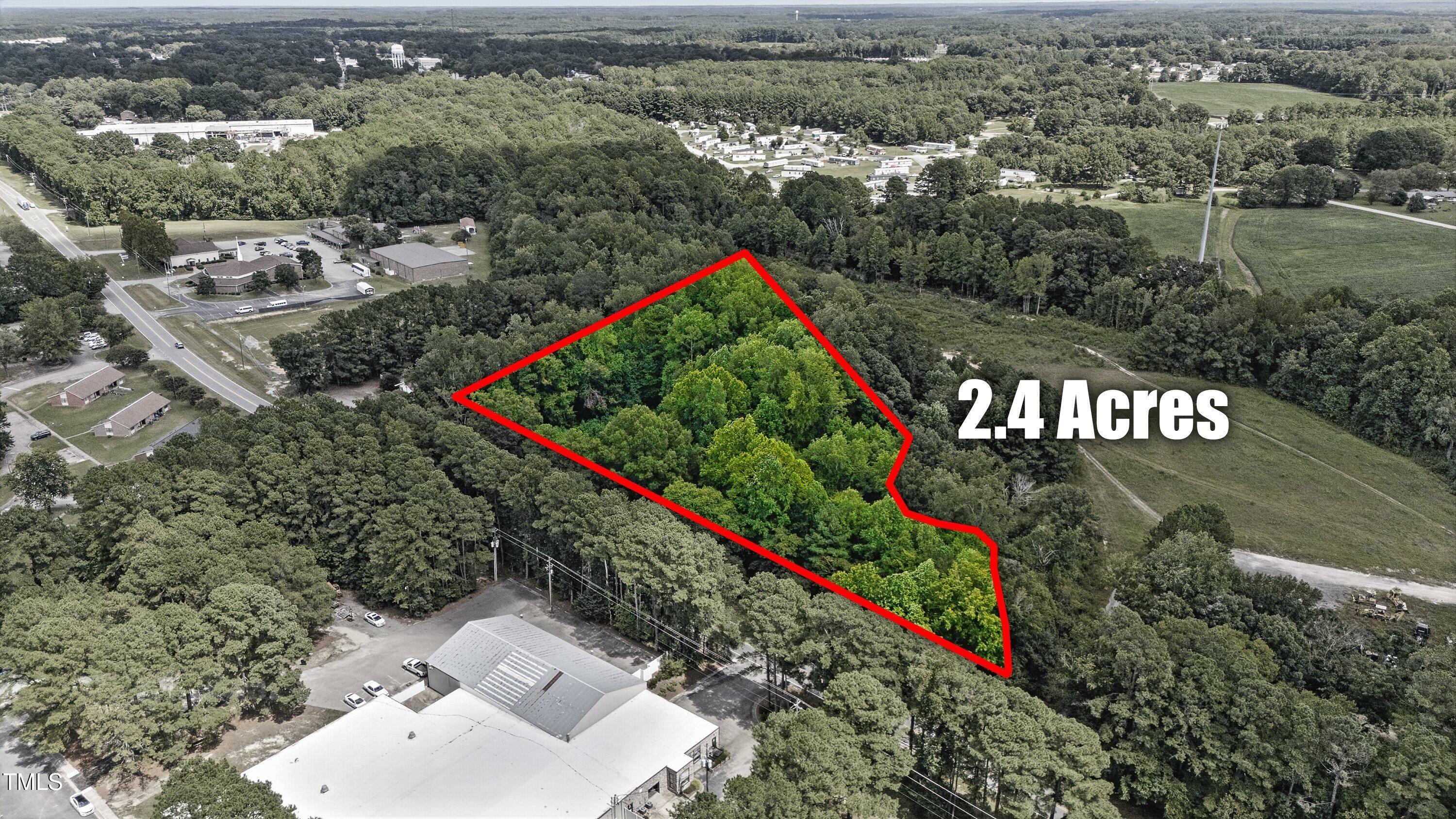901 Mack-Todd Road Zebulon, NC 27597 - Photo 3 of 11 an aerial view of houses and roads