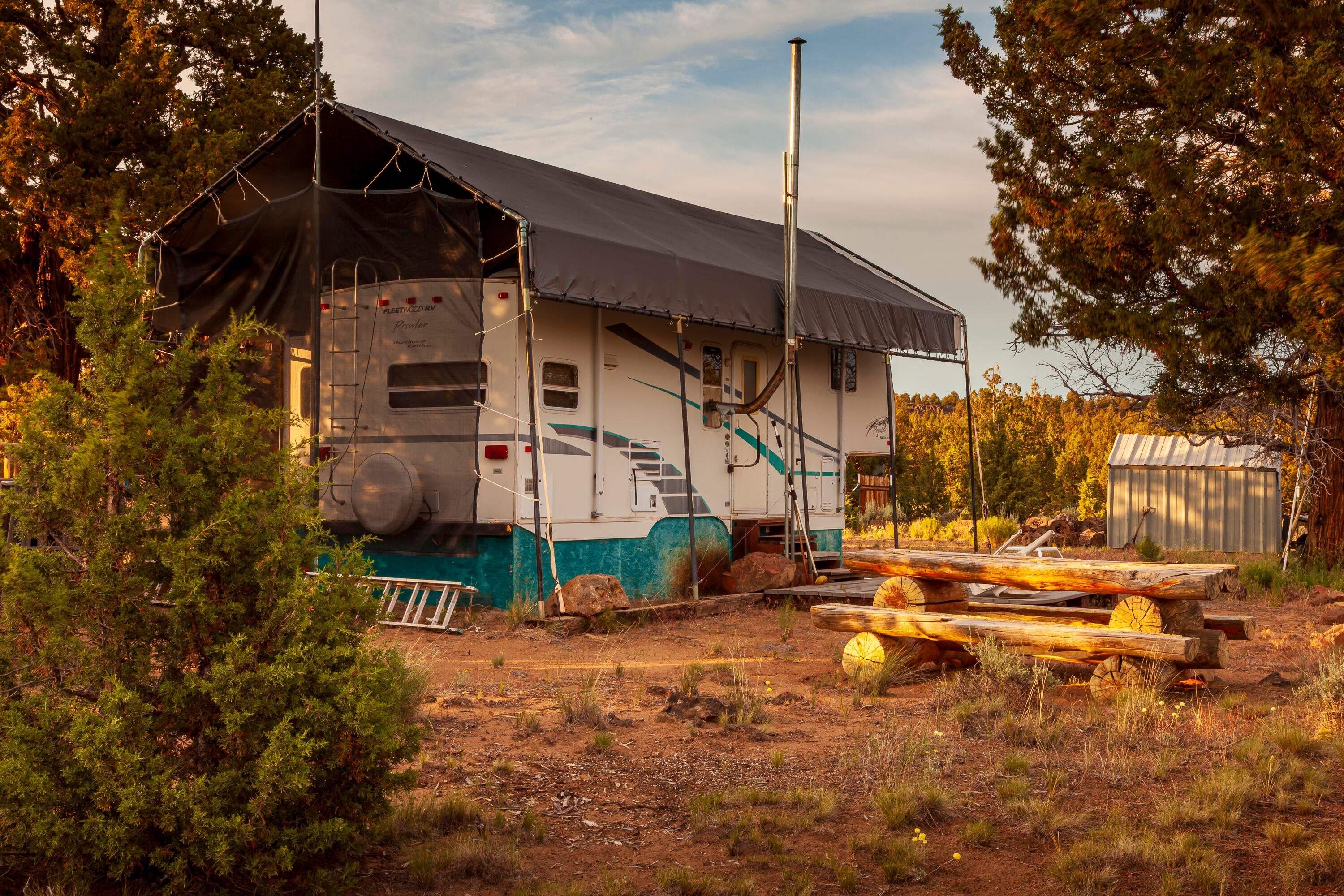 0 Rd 25 Aka Golden View Ranch Rd Bend, Unit LOT 30 Bend, OR 97701 - Photo 12 of 34 5th wheel, canopy, and Juniper log picnic table are included in sale.