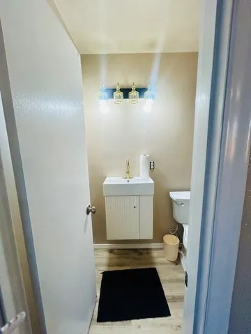 a bathroom with a sink and a vanity