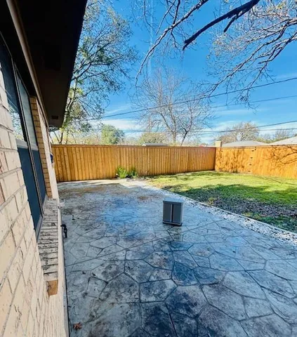 a view of a yard with an outdoor space