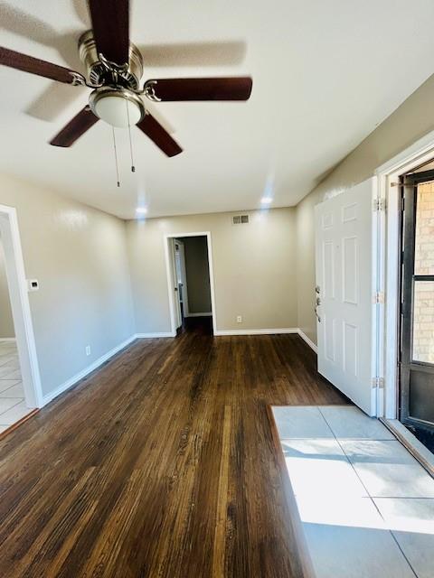 527 Aspen Street Lancaster, TX 75134 - Photo 3 of 18 a view of empty room with wooden floor