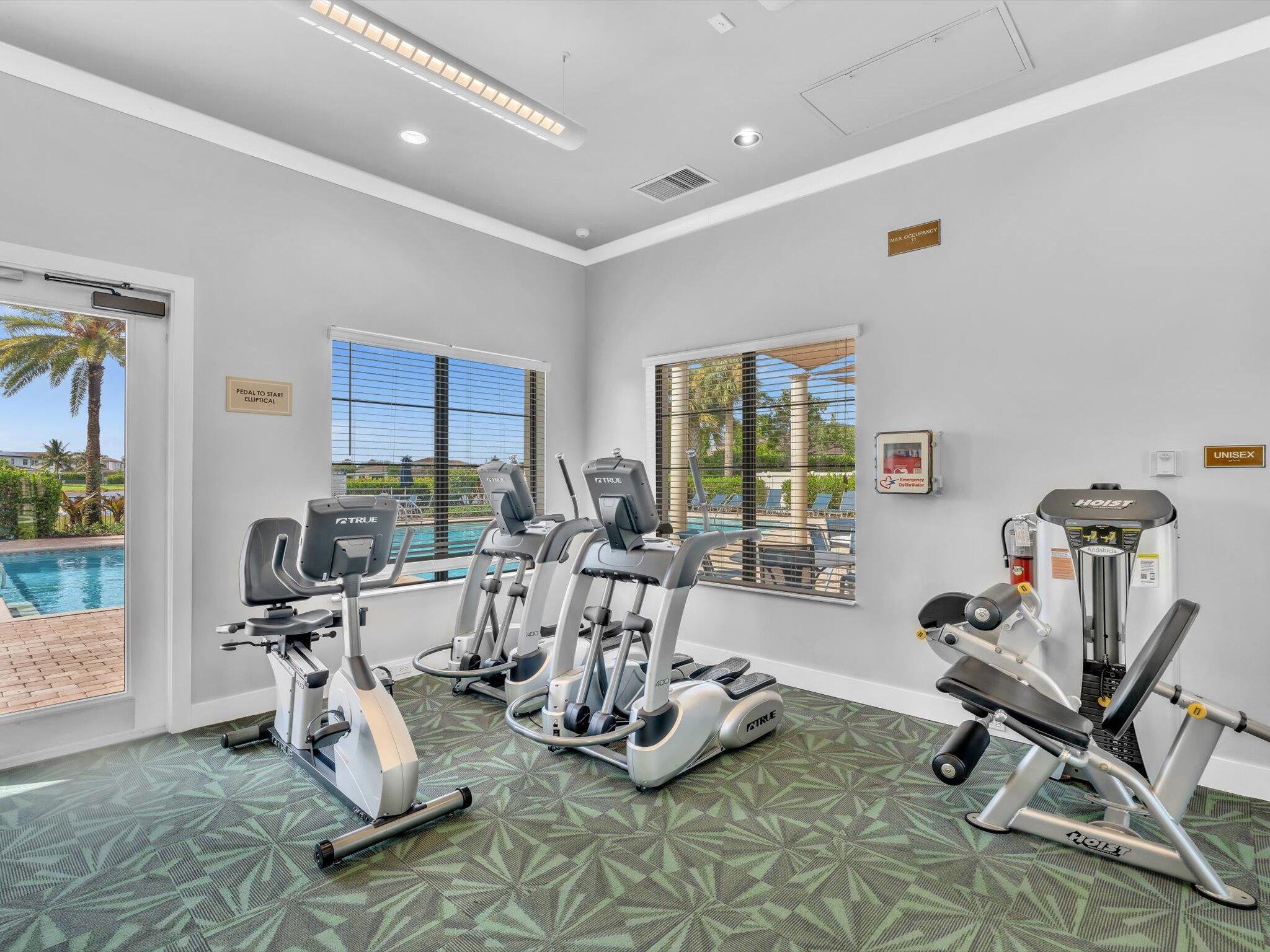 4708 Saddle Ranch Road Lake Worth, FL 33467 - Photo 43 of 45 a view of a room with gym equipment