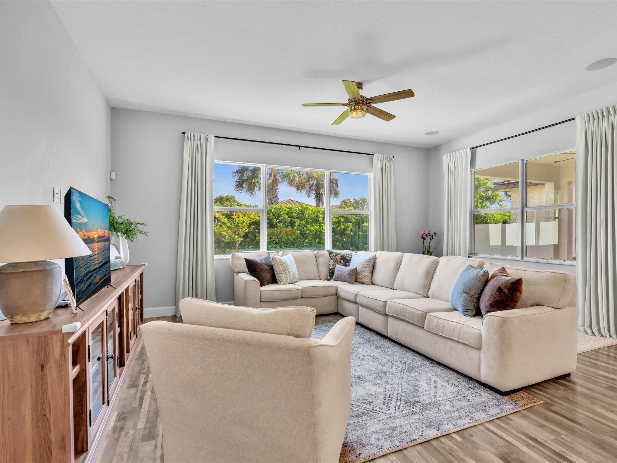 4708 Saddle Ranch Road Lake Worth, FL 33467 - Photo 10 of 45 a living room with furniture and a window