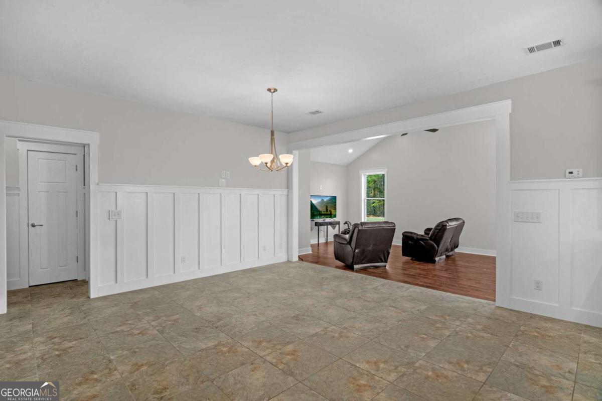 328 Windsor Road Guyton, GA 31312 - Photo 16 of 39 a view of a livingroom with a lounge chair