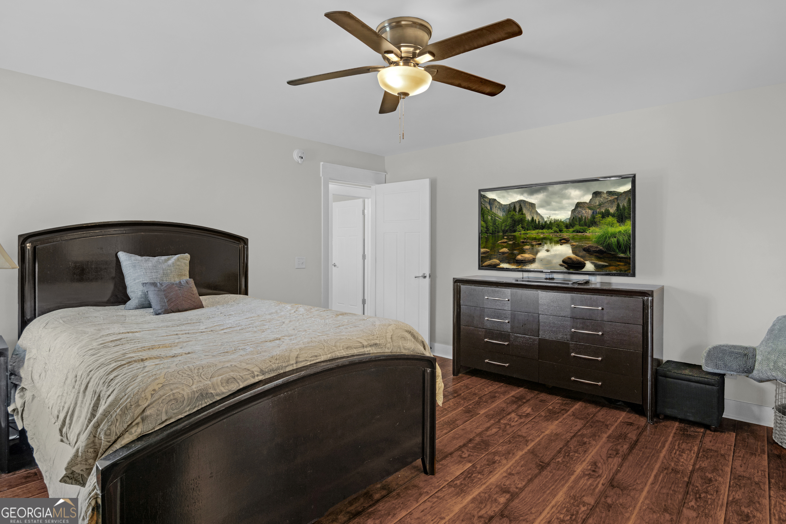 328 Windsor Road Guyton, GA 31312 - Photo 29 of 39 a bedroom with a bed and a dresser