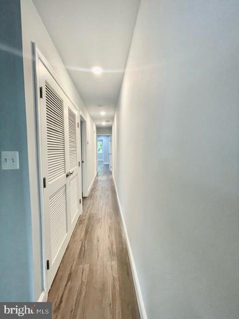 1812 North Smallwood Street Baltimore, MD 21216 - Photo 7 of 21 a view of a hallway with wooden floor