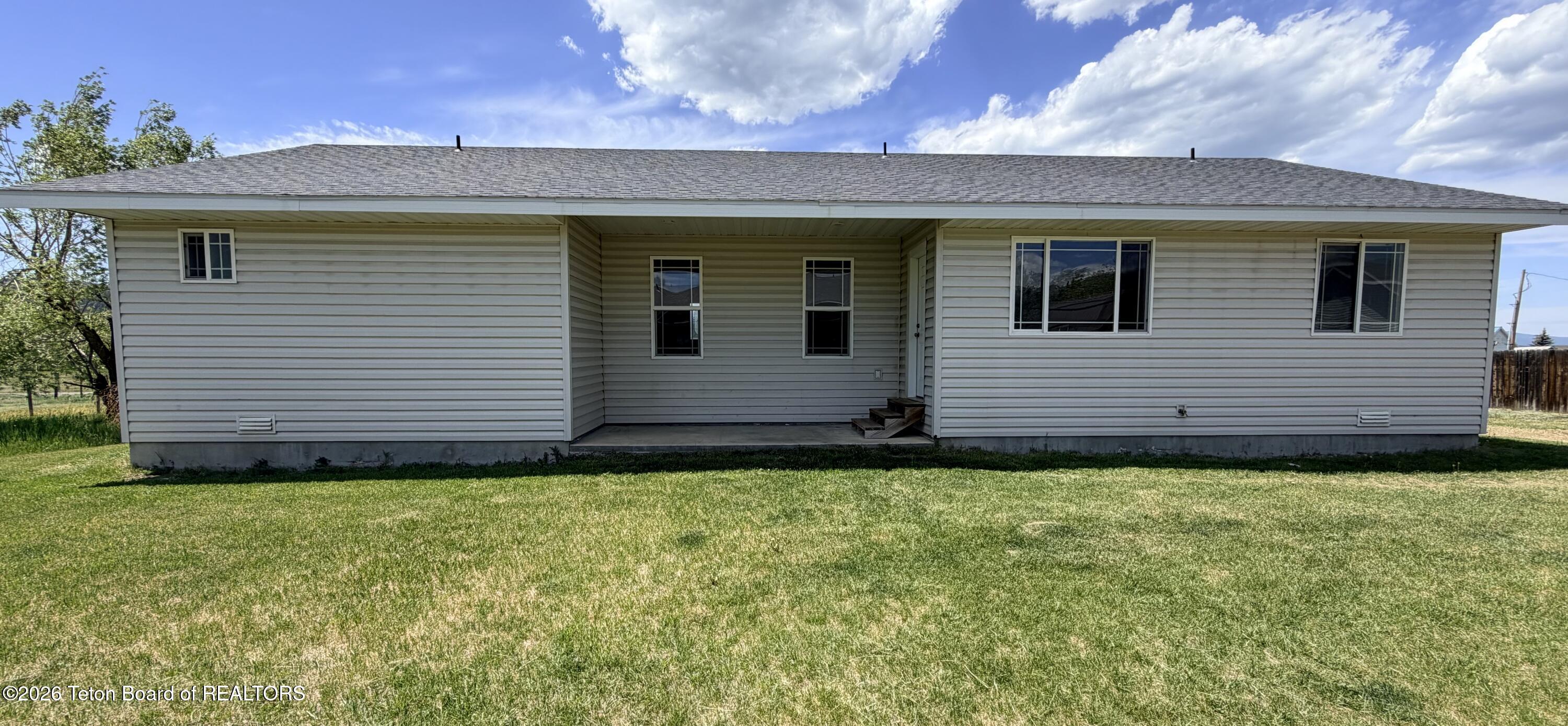 7 Water Tank Road Thayne, WY 83127 - Photo 2 of 22 Outside Back View