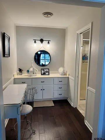 a kitchen with a sink and a refrigerator