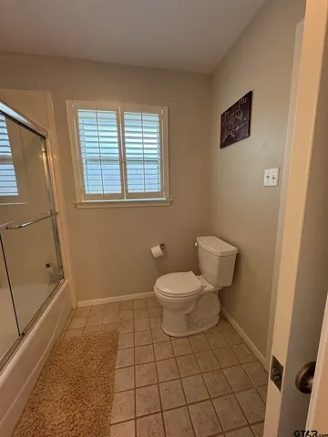 a bathroom with a toilet