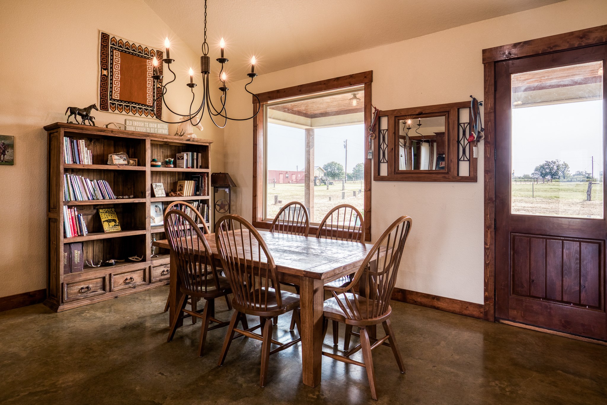 8201 Lone Star Road Washington, TX 77880 - Photo 11 of 22 a view of a dining room with furniture window and wooden floor