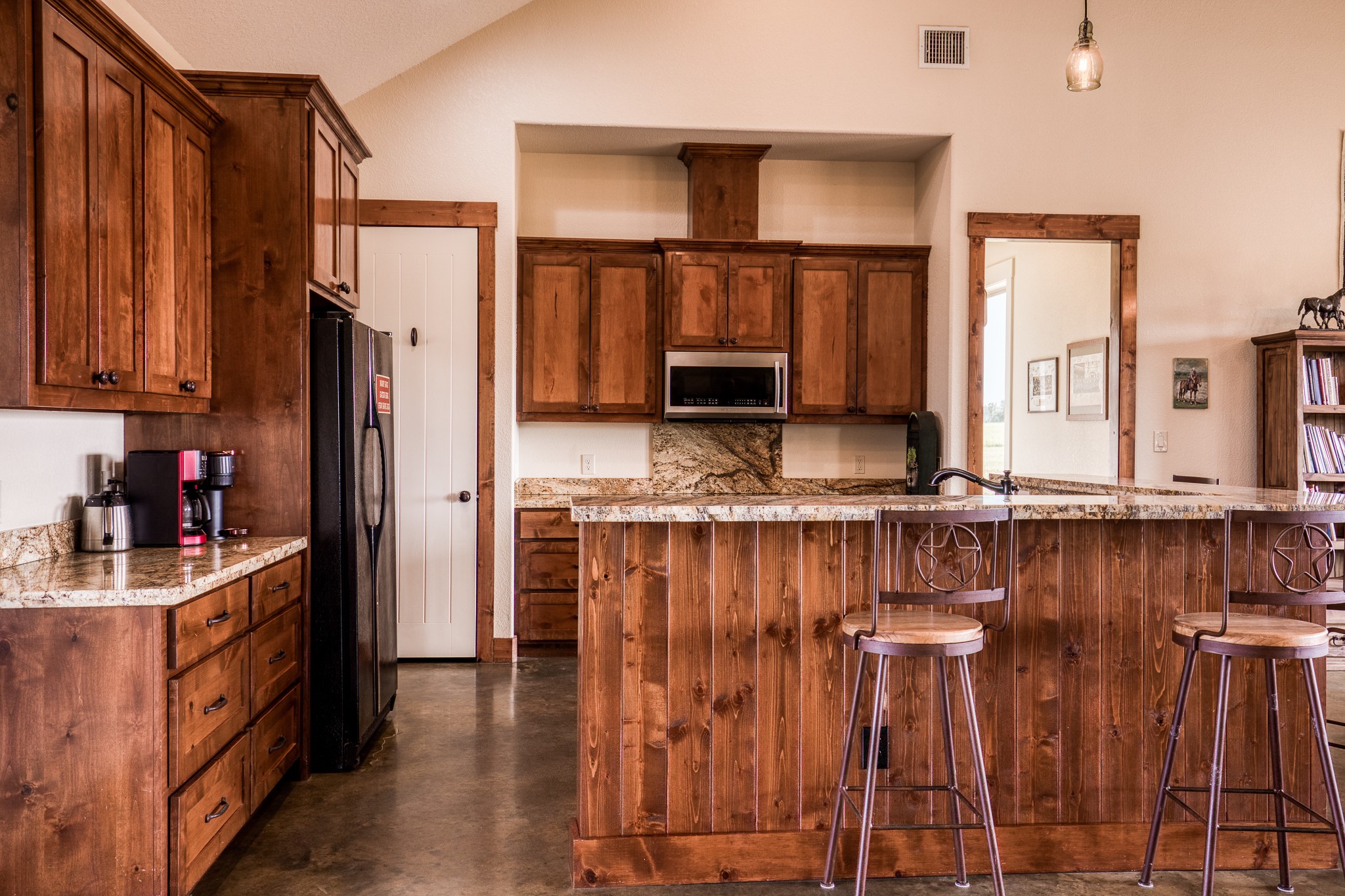 8201 Lone Star Road Washington, TX 77880 - Photo 12 of 22 a kitchen with stainless steel appliances a refrigerator and a stove top oven