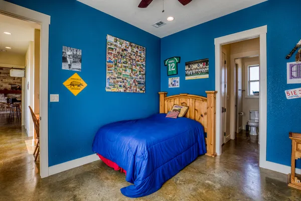 a bedroom with a bed and furniture