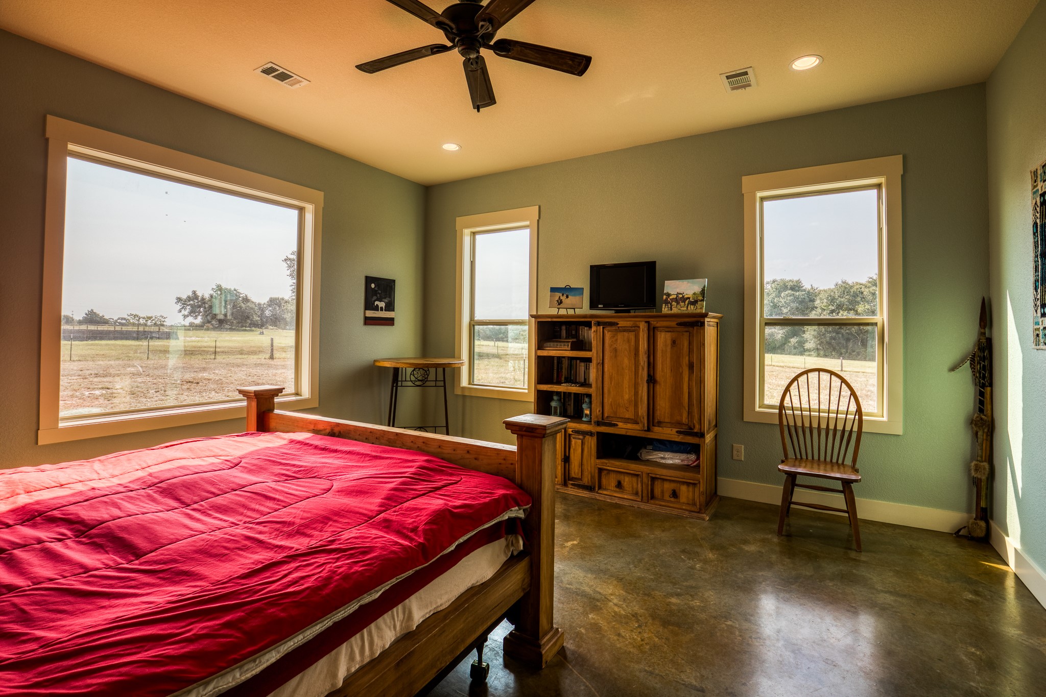 8201 Lone Star Road Washington, TX 77880 - Photo 16 of 22 a bedroom with a bed and furniture