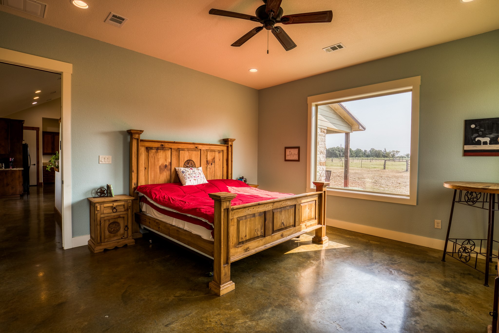 8201 Lone Star Road Washington, TX 77880 - Photo 17 of 22 a bedroom with a bed and a desk