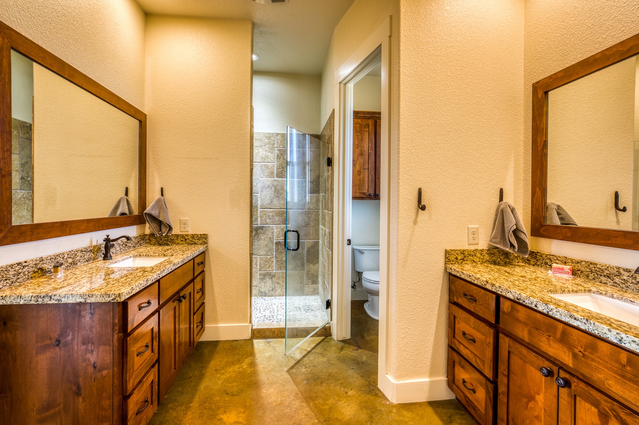 8201 Lone Star Road Washington, TX 77880 - Photo 18 of 22 a bathroom with a granite countertop sink and a mirror