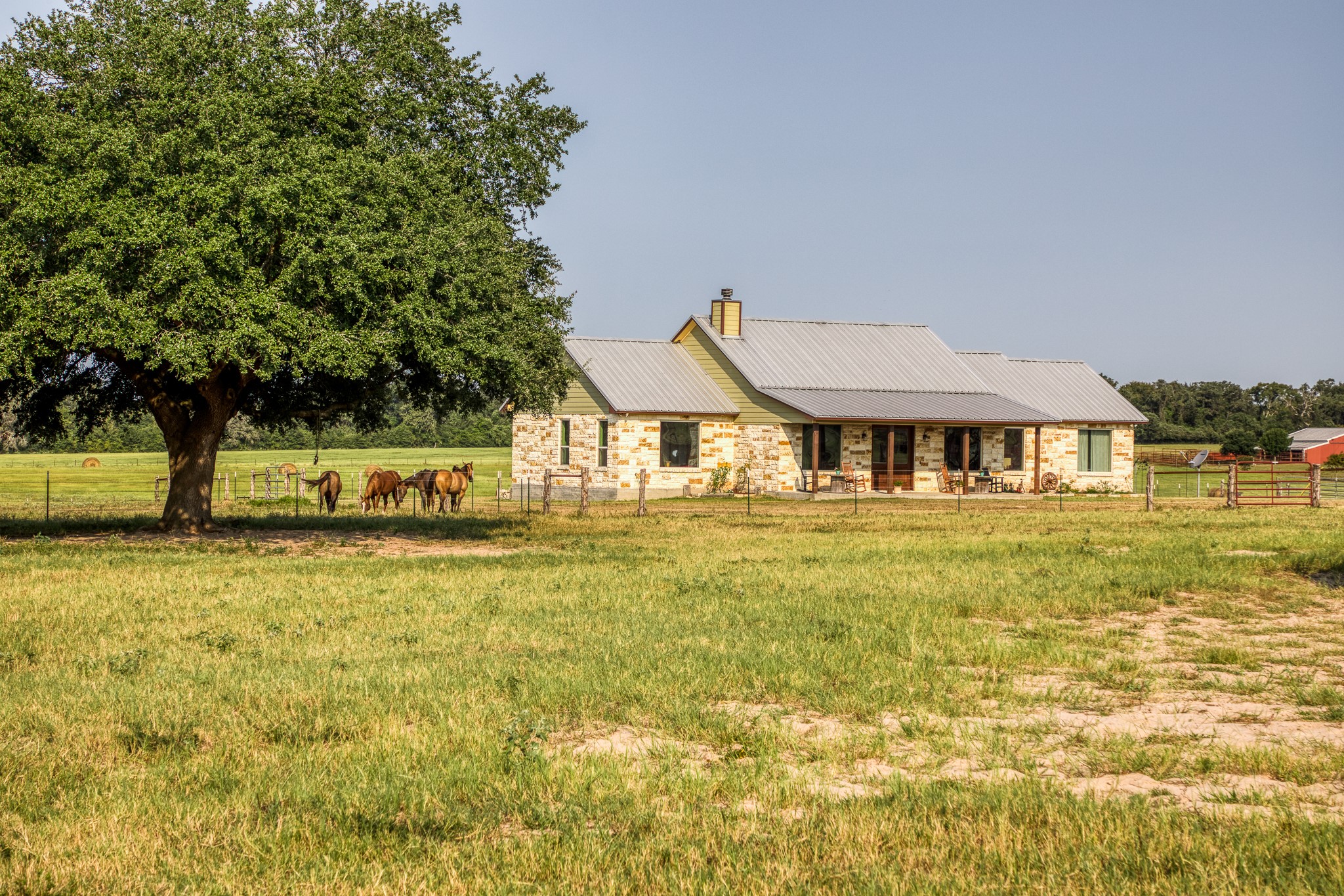 8201 Lone Star Road Washington, TX 77880 - Photo 3 of 22 a front view of a house with a garden