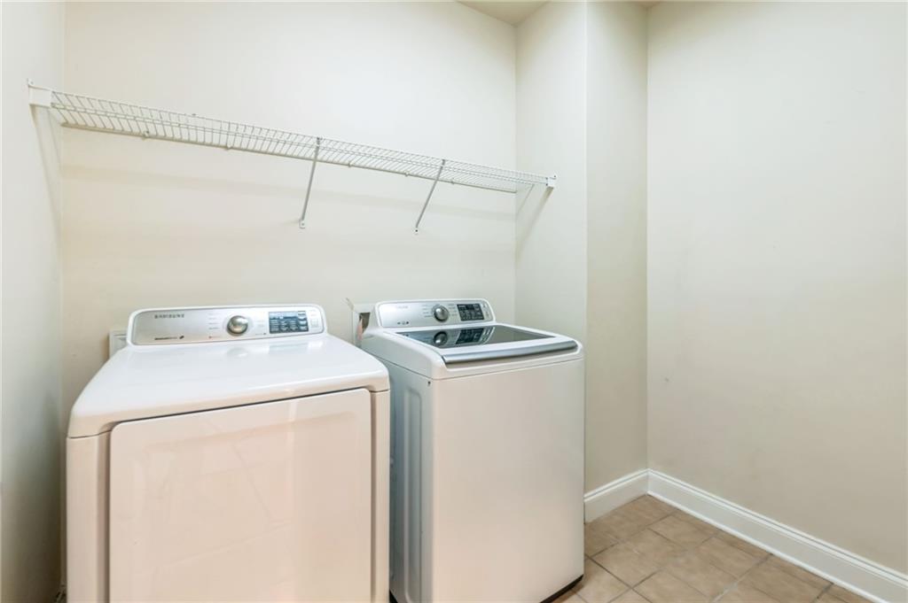 242 16th Street Northwest, Unit 14 Atlanta, GA 30363 - Photo 30 of 32 a utility room with dryer and washer