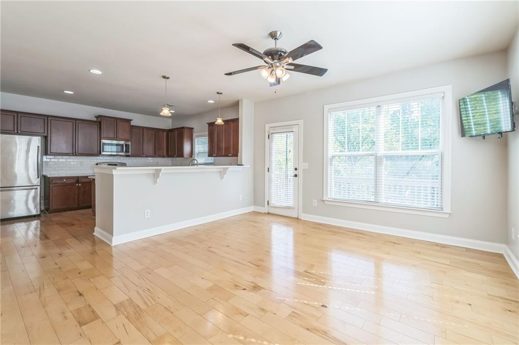 242 16th Street Northwest, Unit 14 Atlanta, GA 30363 - Photo 9 of 32 a view of a kitchen with a sink and a window