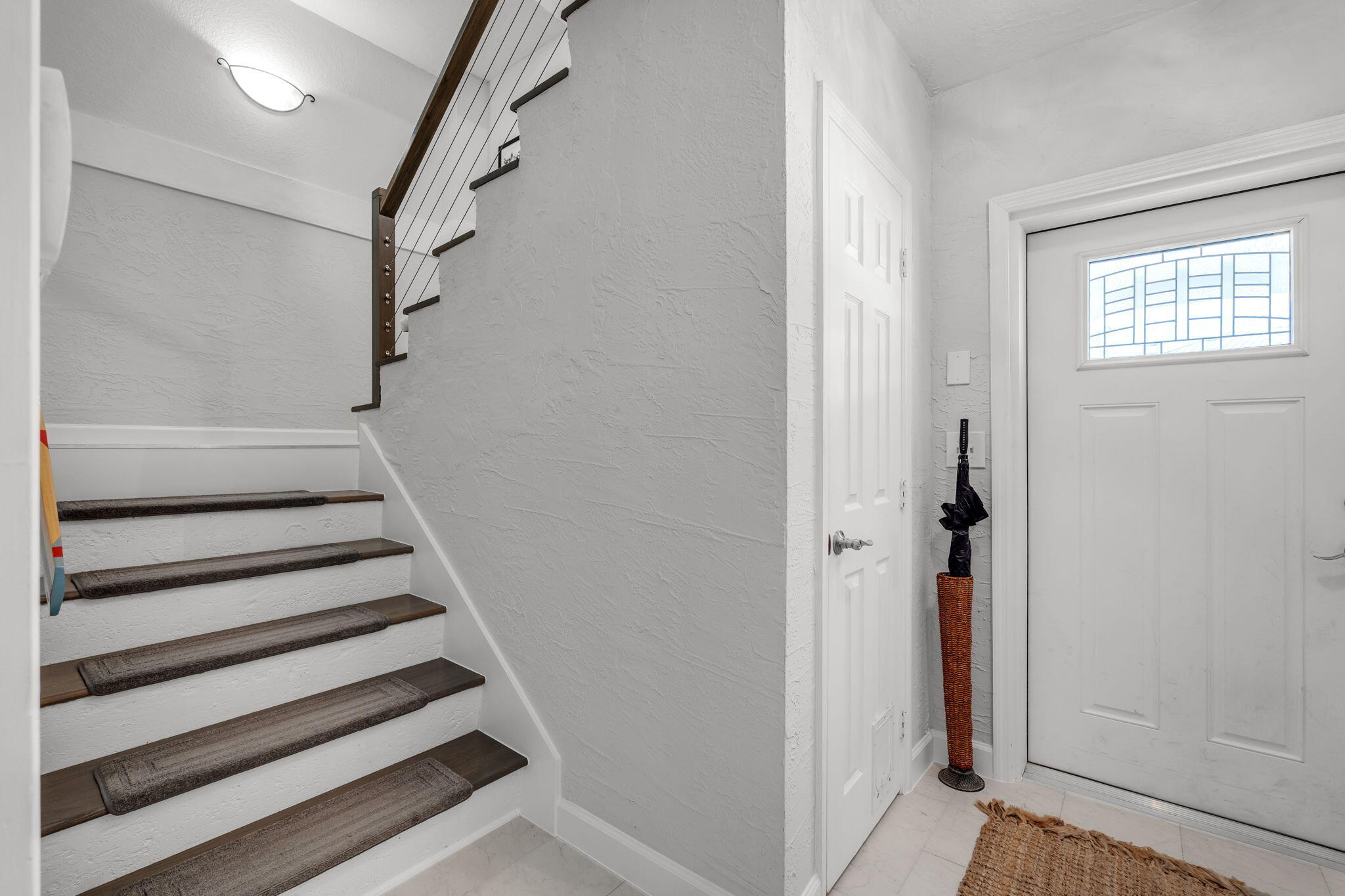 24 Mutiny Place Key Largo, FL 33037 - Photo 13 of 69 a view of entryway with wooden floor and stairs
