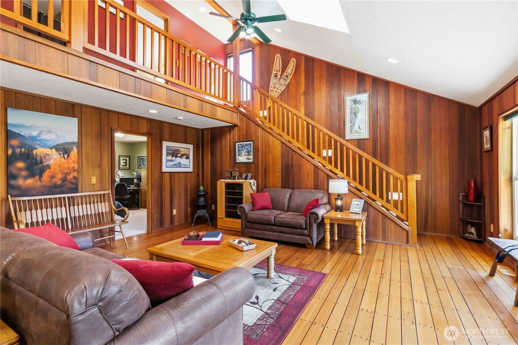 359 Frank Smith Road Toutle, WA 98649 - Photo 13 of 40 a balcony with furniture and wooden floor