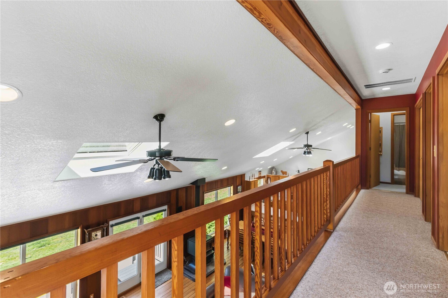 359 Frank Smith Road Toutle, WA 98649 - Photo 18 of 40 a view of a hallway with a chandelier