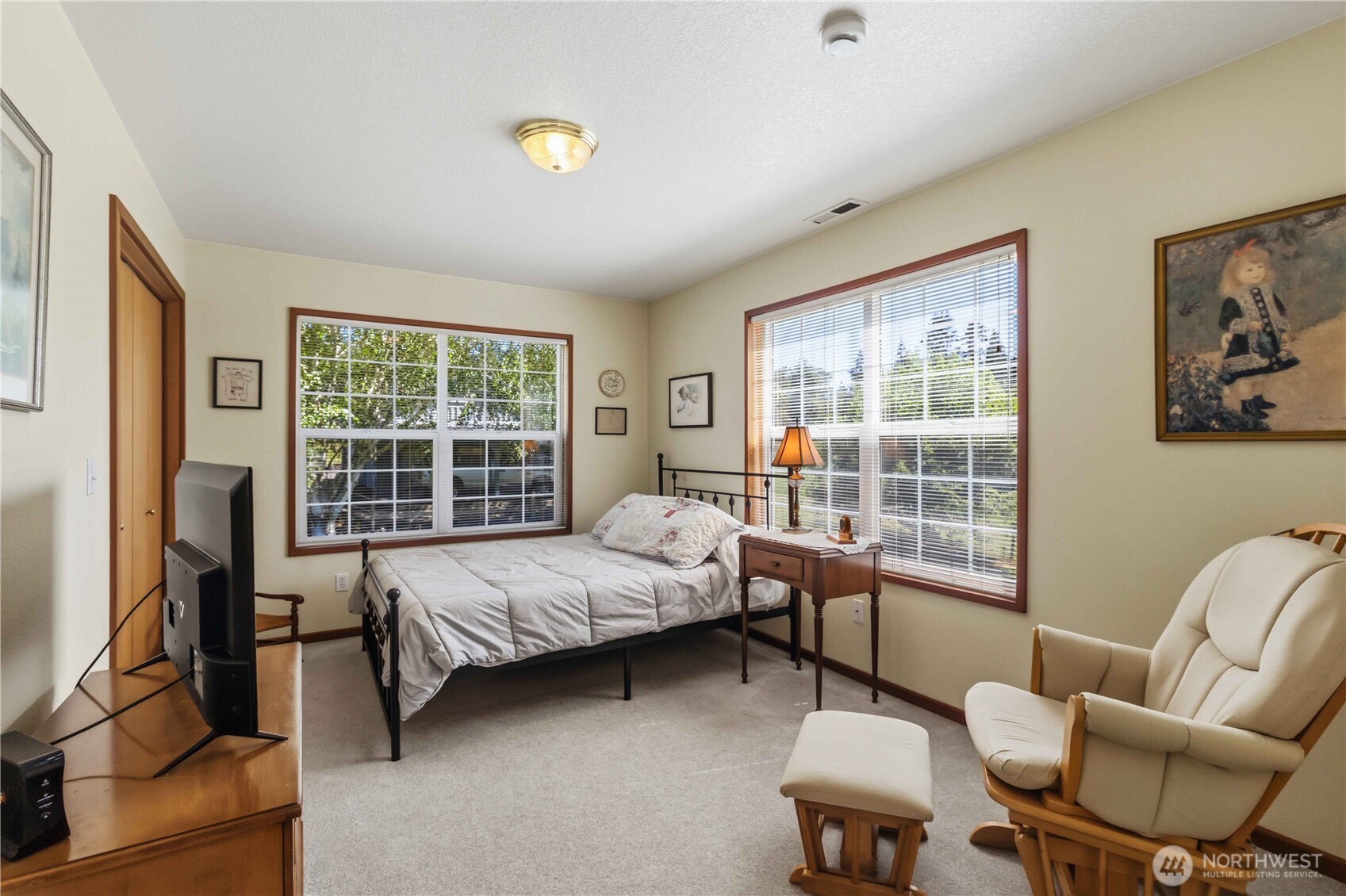 359 Frank Smith Road Toutle, WA 98649 - Photo 20 of 40 a bedroom with a bed chair and window