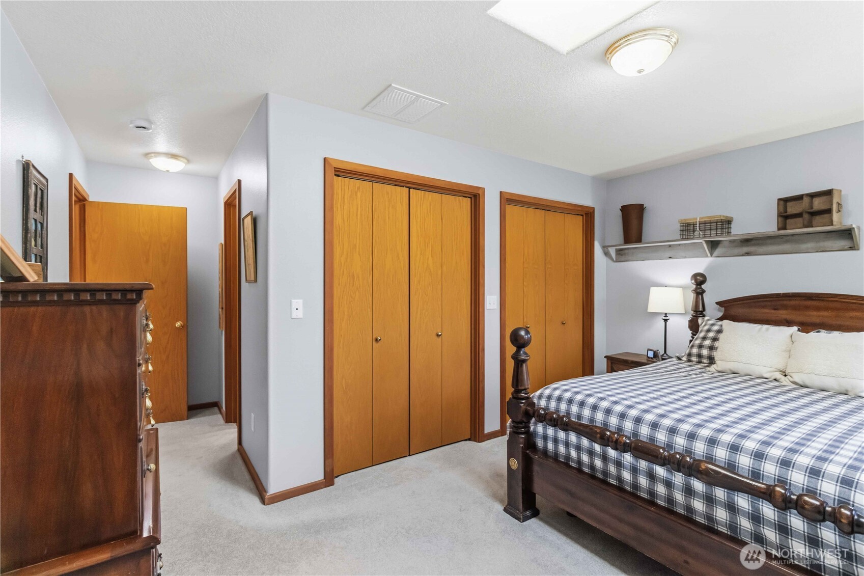 359 Frank Smith Road Toutle, WA 98649 - Photo 23 of 40 a bedroom with a bed and a view of bathroom
