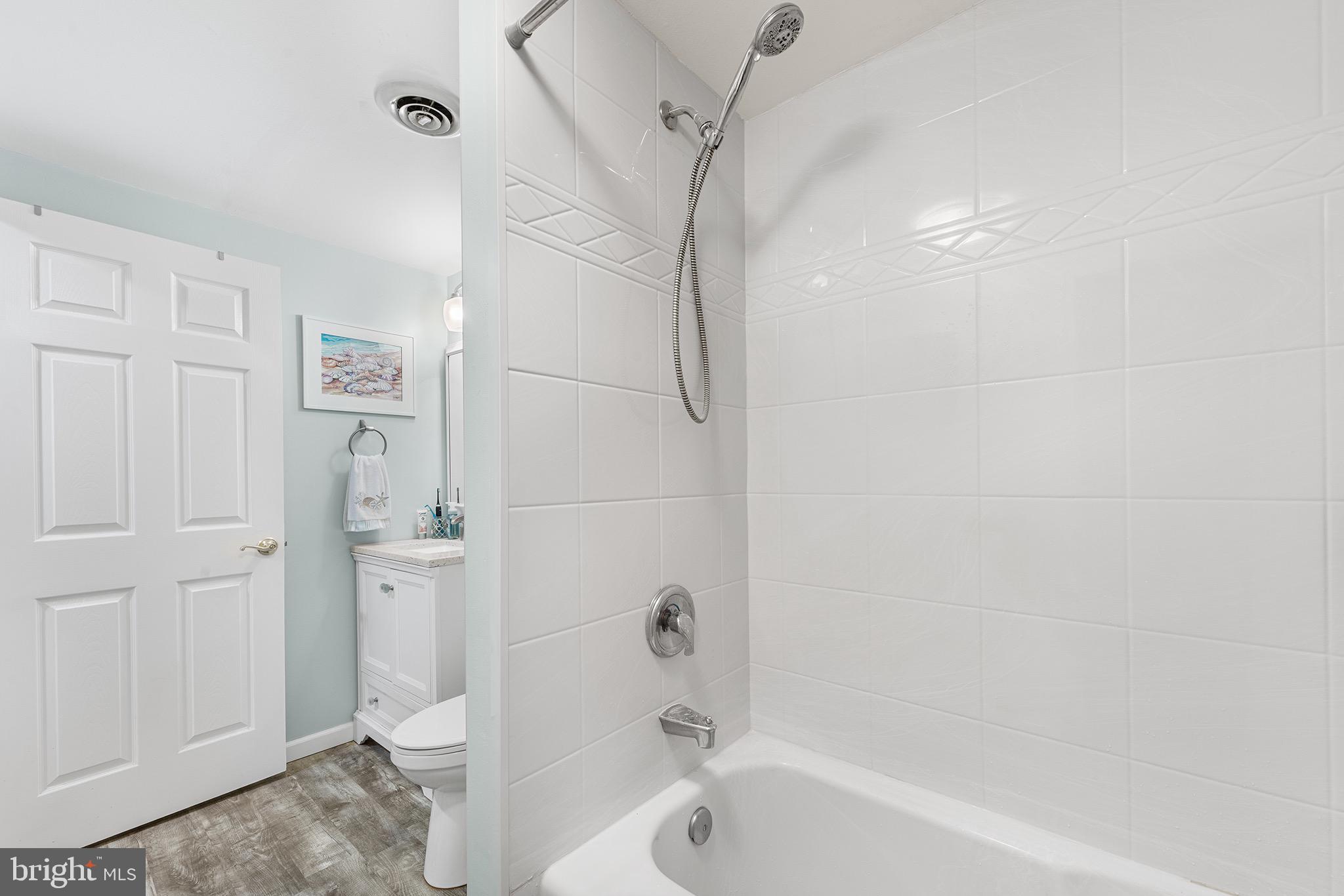 405 East Millstream Road Cream Ridge, NJ 08514 - Photo 19 of 37 a bathroom with a toilet and a shower