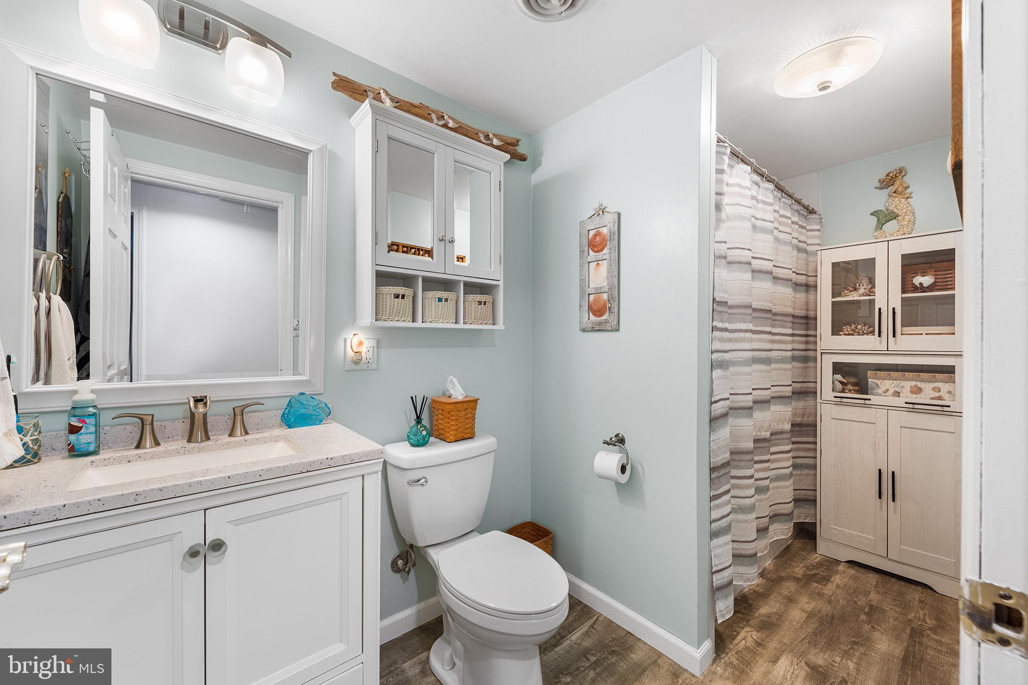 405 East Millstream Road Cream Ridge, NJ 08514 - Photo 20 of 37 a bathroom with a toilet sink and mirror