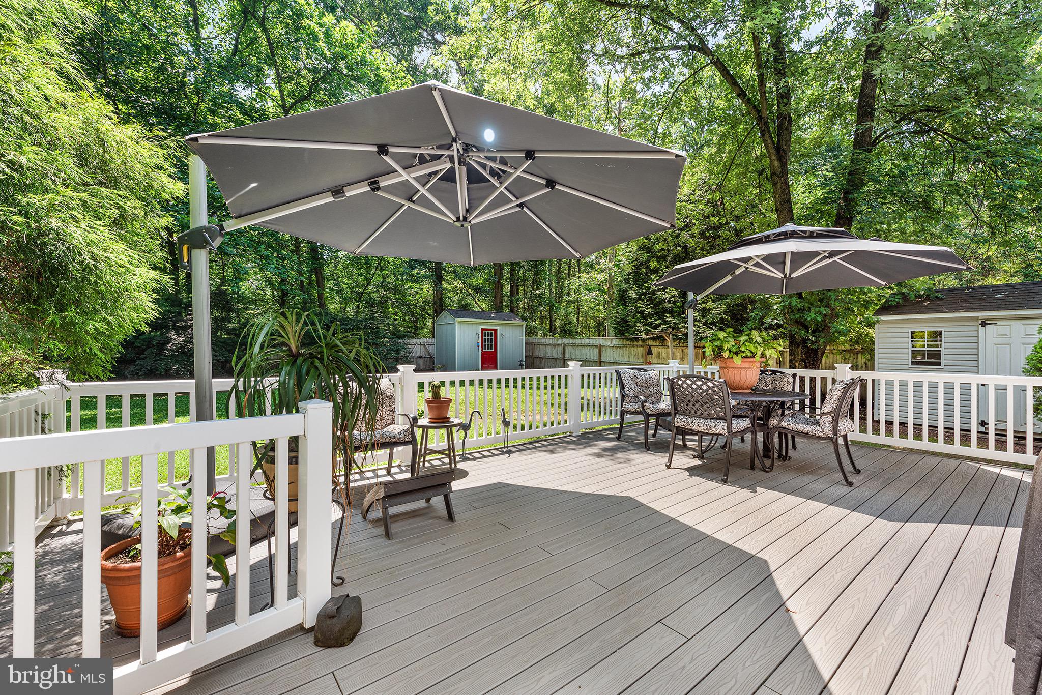 405 East Millstream Road Cream Ridge, NJ 08514 - Photo 25 of 37 an outdoor space with furniture and umbrella