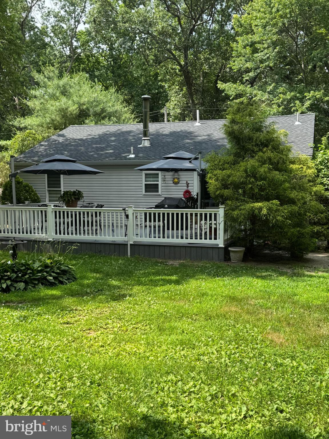 405 East Millstream Road Cream Ridge, NJ 08514 - Photo 33 of 37 a view of a house with a yard