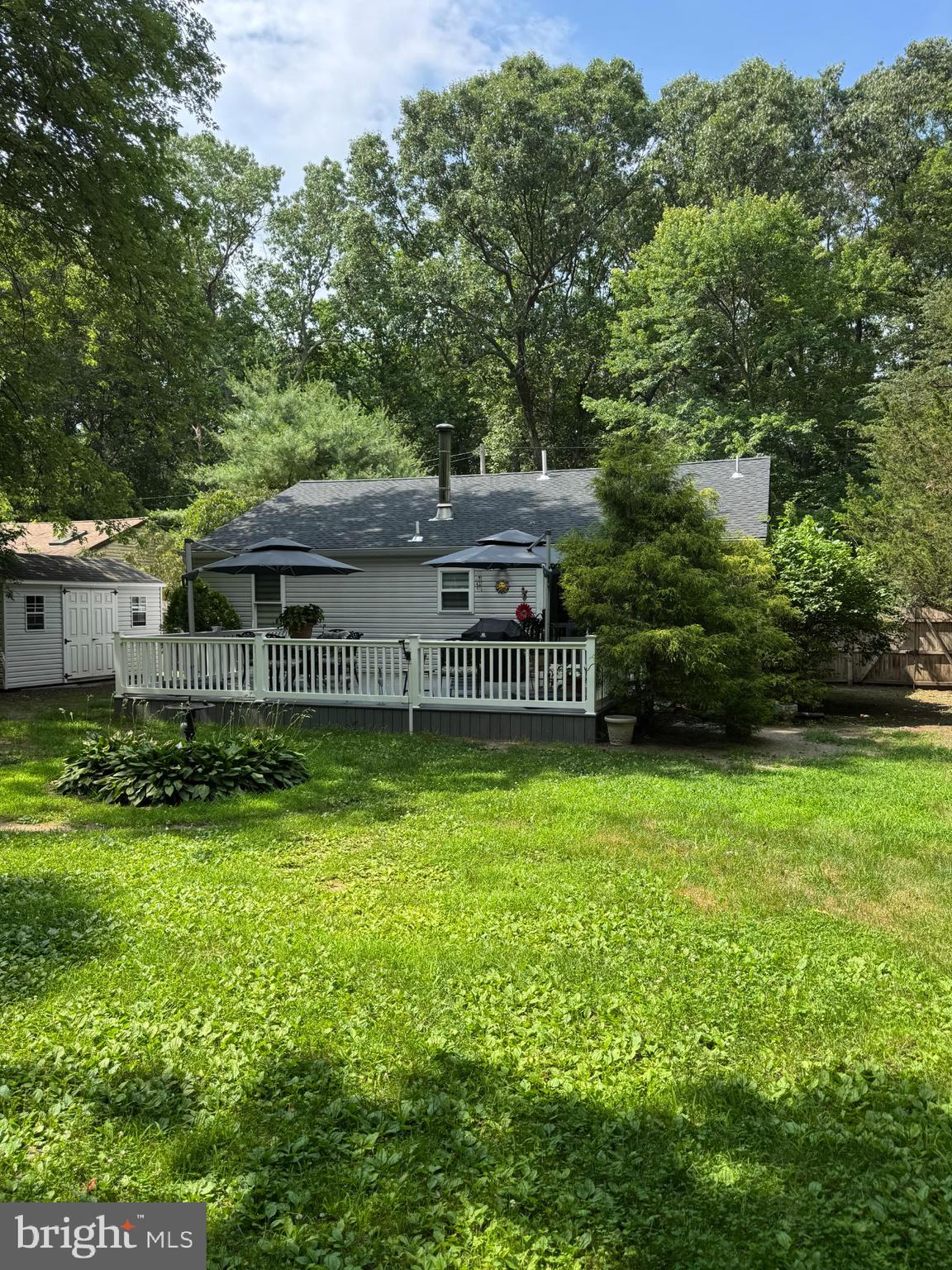 405 East Millstream Road Cream Ridge, NJ 08514 - Photo 34 of 37 a view of a house with a garden
