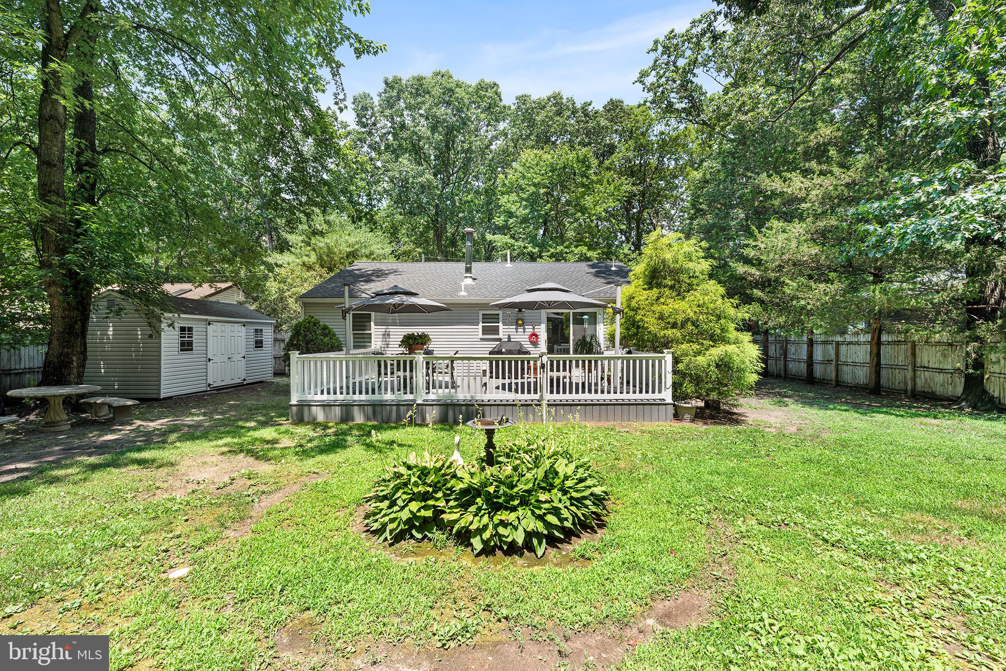 405 East Millstream Road Cream Ridge, NJ 08514 - Photo 36 of 37 front view of a house with a big yard