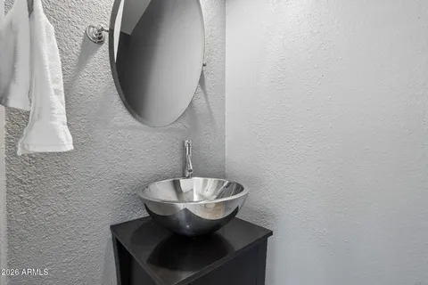 a kitchen with a sink and a window