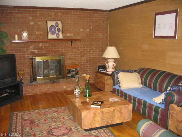 Other. Spacious den, cozy with gas logs in brick fireplace, nice hardwoods!