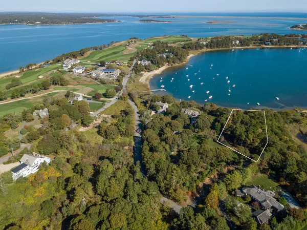 a view of an ocean and a mountain