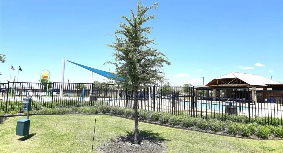 706 Spur Ridge Princeton, TX 75407 - Photo 35 of 36 View of community with a patio and a swimming pool
