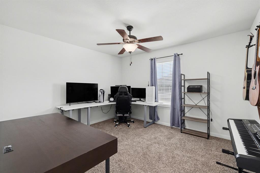 706 Spur Ridge Princeton, TX 75407 - Photo 8 of 36 Home office featuring light carpet and ceiling fan