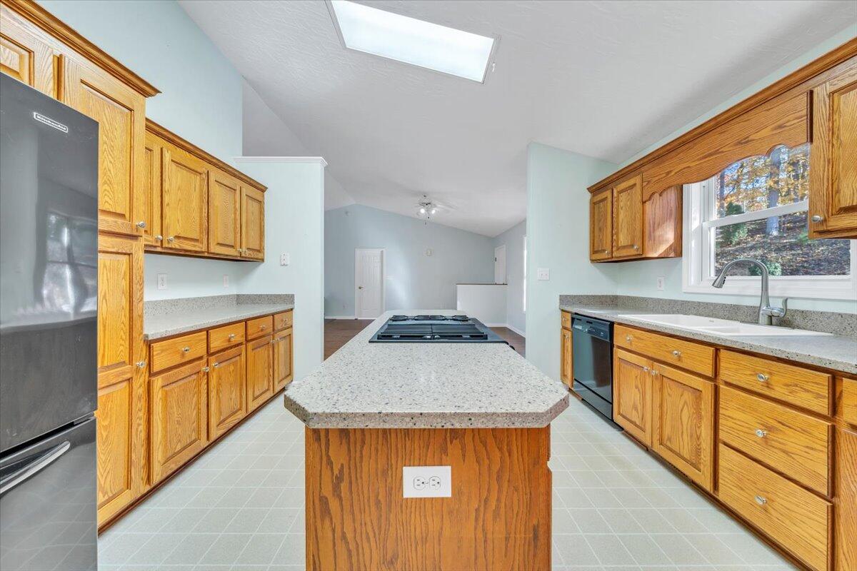 6548 Goodview Road Goodview, VA 24095 - Photo 11 of 113 a kitchen with stainless steel appliances granite countertop a sink stove and cabinets