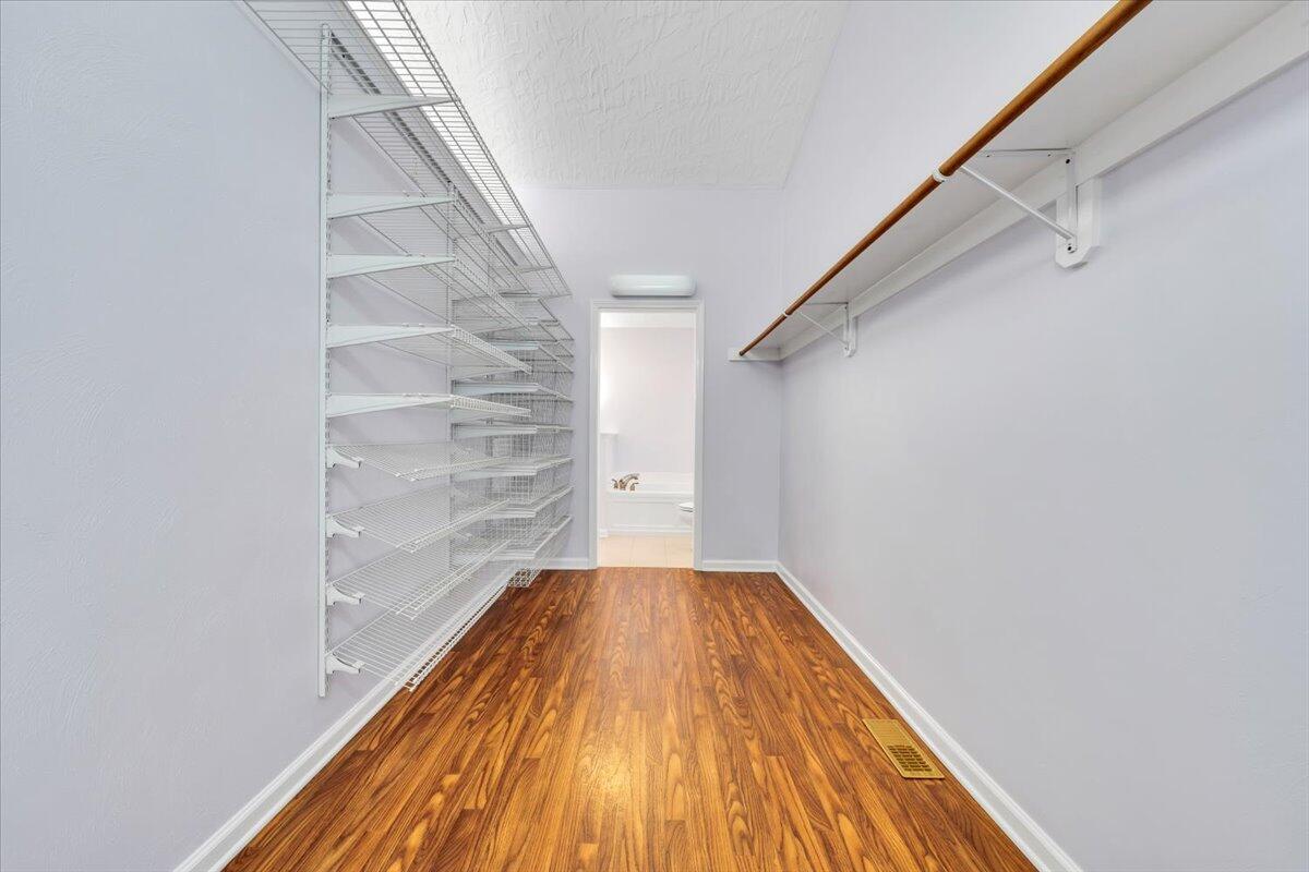 6548 Goodview Road Goodview, VA 24095 - Photo 20 of 113 a view of a hallway with wooden floor and staircase