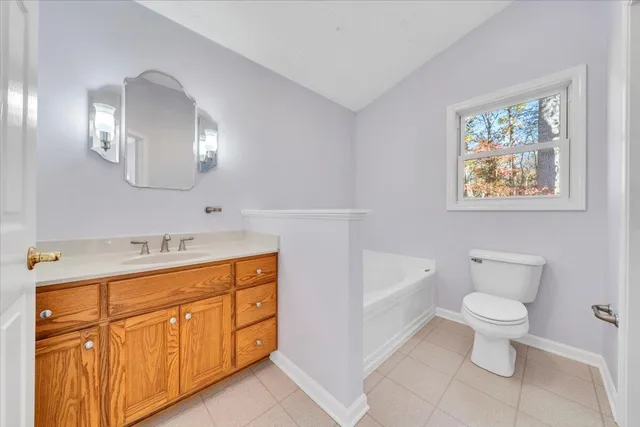 a picture of a bathroom with a sink and mirror